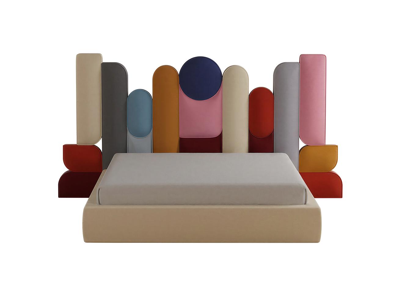 The ej ee bed features a cotton velvet upholstered headboard that resembles a playful tetris game, where the geometric shapes fit perfectly with each other. This statement piece creates an artsy focal point in any interior design scheme, turning the bedroom into a true sanctuary for art lovers.
