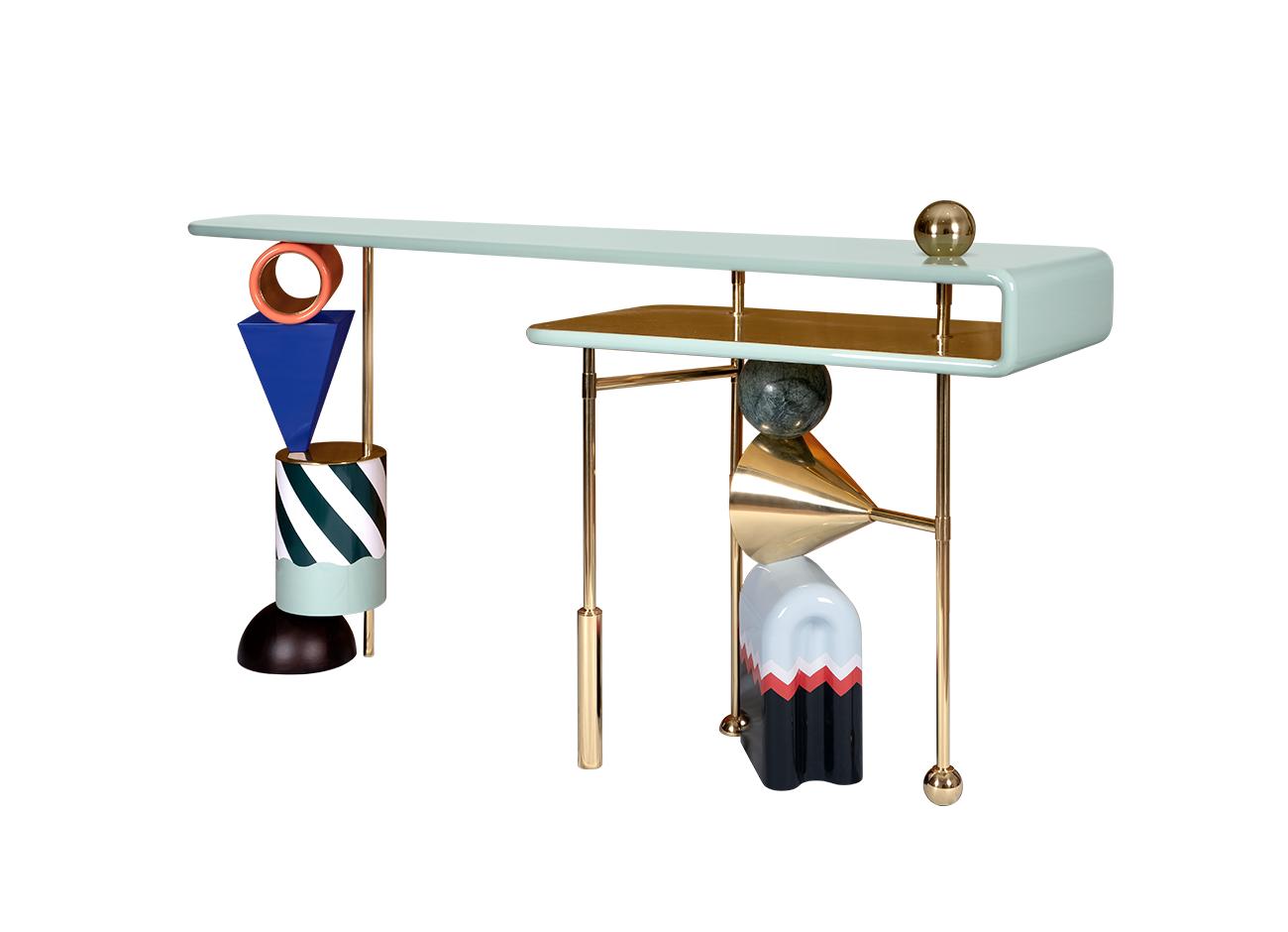 Ahrt console Right view of the ahrt console showcasing its deliberately mismatched colors, diverse materials such as wood, marble, and brass, and the unconventional mix of shapes that define this unique piece.