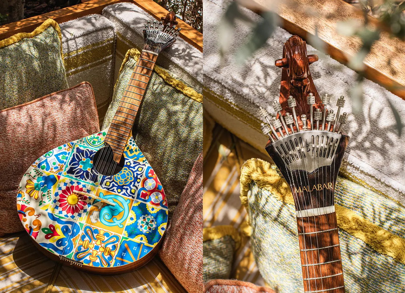 Azulejo I guitar with hand-painted tile pattern, featured at Lana Lusa Restaurant in Dubai, UAE.