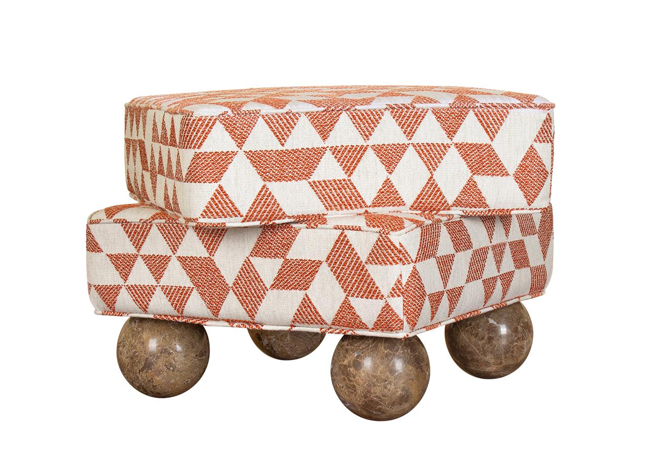 Madonna Stool Madonna Stool showcasing all four Emperador marble sphere legs, paired with an orange Jacquard fabric.