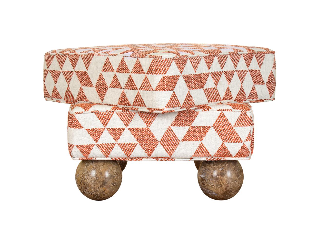 Madonna Stool Madonna Stool showcasing two Emperador marble sphere legs, paired with an orange Jacquard fabric.