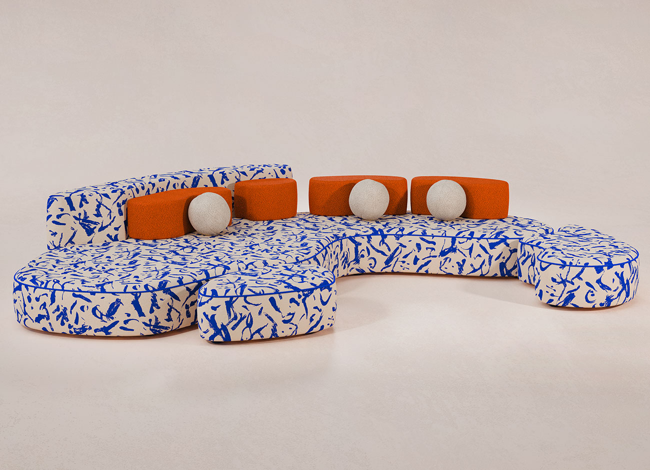 Mood Sofa Mood sofa upholstered in Ichi-go Ichi-e 001 fabric by Dedar, featuring blue strokes and accented with orange pillows