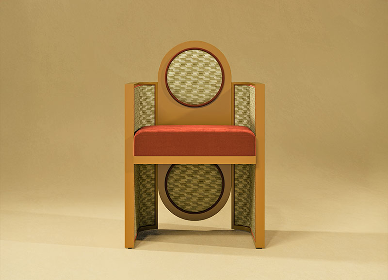Mak Suh Muh dining chair featuring an alloy orange lacquer and upholstered in the patterned Strings Monochrome (K5368/04) and orange Ice II Tangerine (K5159/64) fabrics by Kirby Design. The piece is positioned in a yellow background,