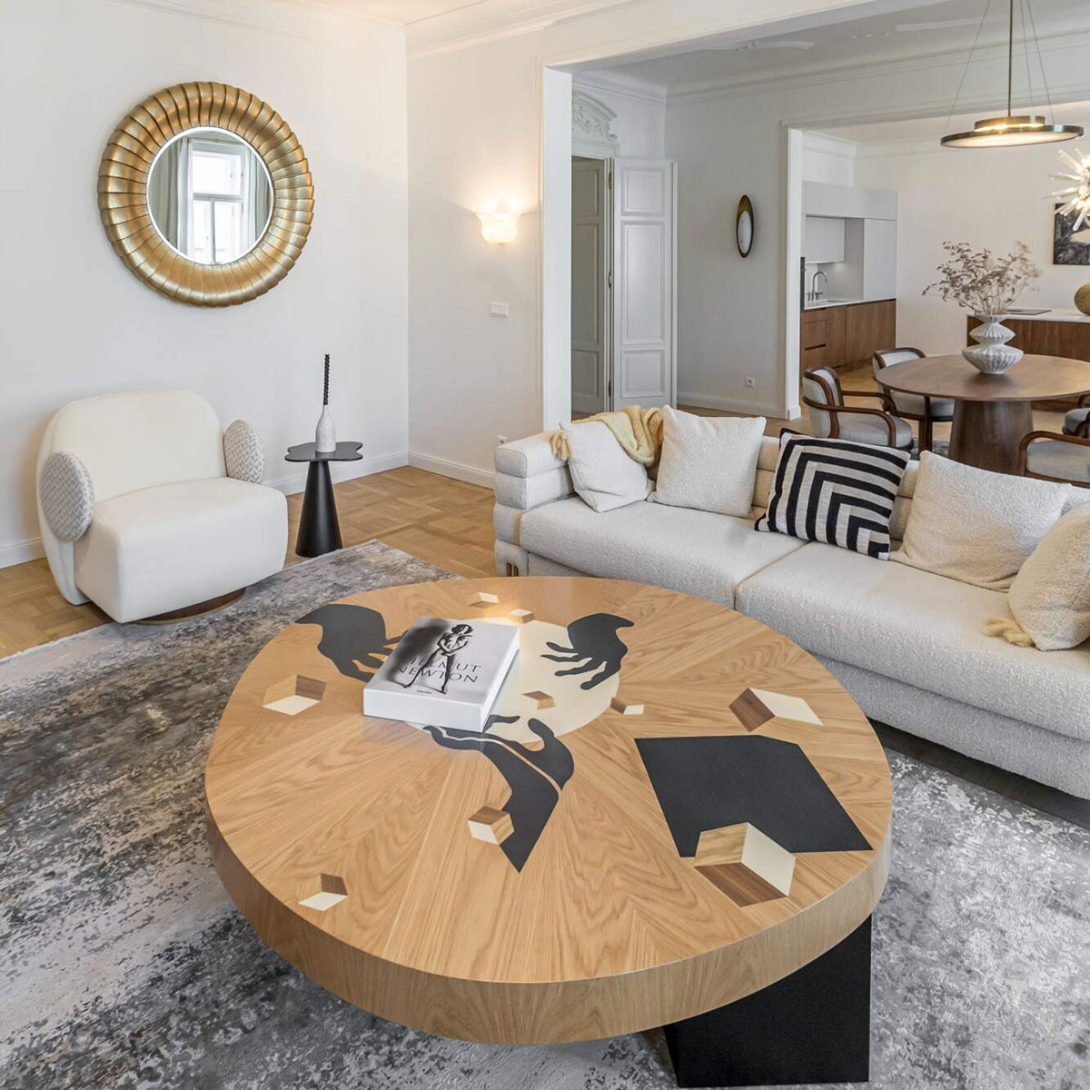 Zborovská Apartment living room with In Vij En center table in front and La voix armchair by B33group