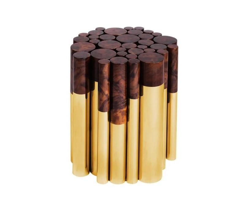 The Wanderlust Side Table, by Malabar features a variety of pipes in polished brass and walnut root that carry an artificial yet natural flair into any luxury interior space bringing a piece of art in your room.