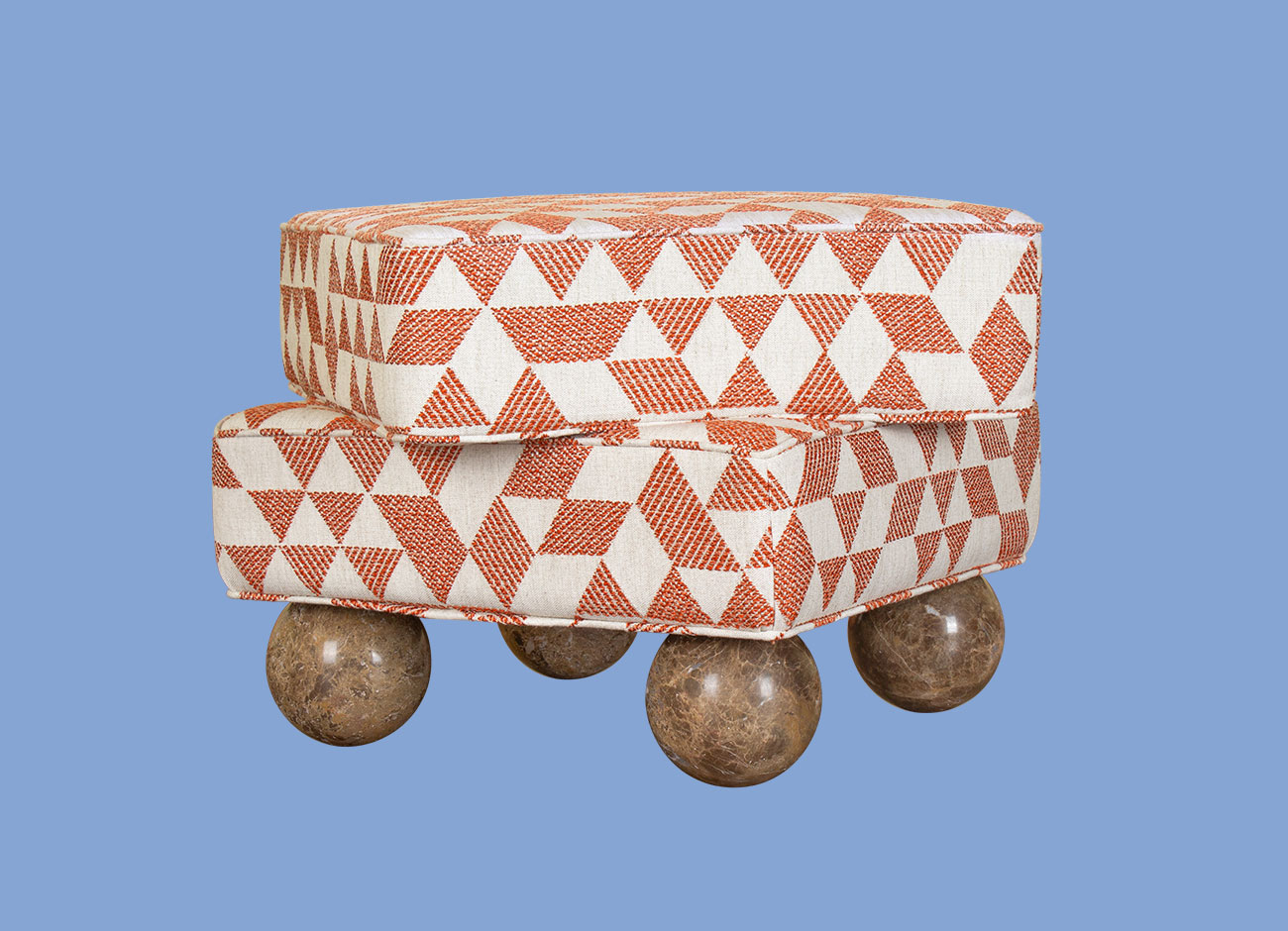Madonna Stool Madonna Stool showcasing all four Emperador marble sphere legs, paired with an orange Jacquard fabric.