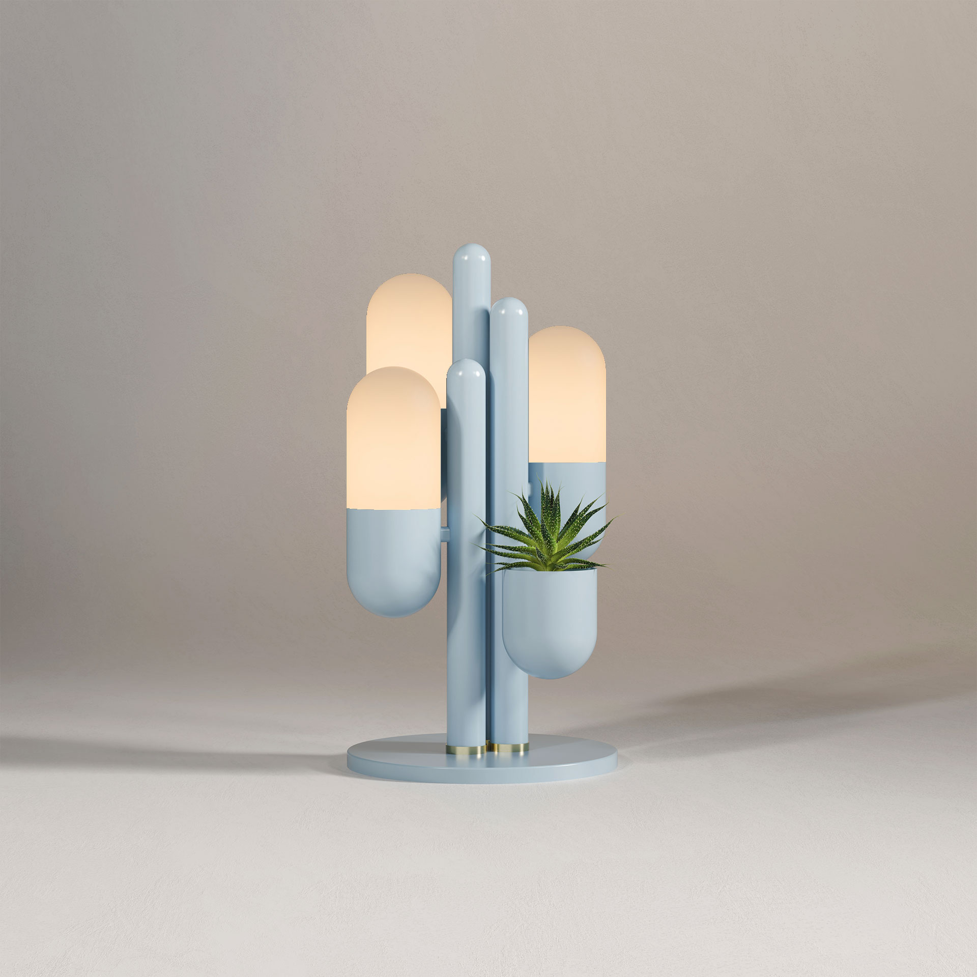 Cactus table lamp lacquered in baby blue with the light turned on.