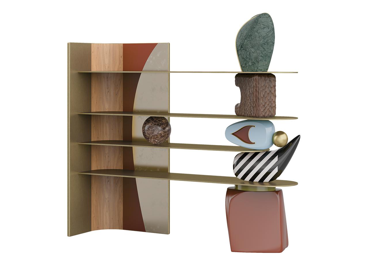 A high-resolution image of the echoes bookshelf at a slight angle against a black background. The shot focuses on the contrast between the industrial precision of the gold shelves and the handcrafted feel of the supporting pieces: a textured wooden block, a light blue ceramic piece with a gold "v" detail, and a vertical green stone crown.