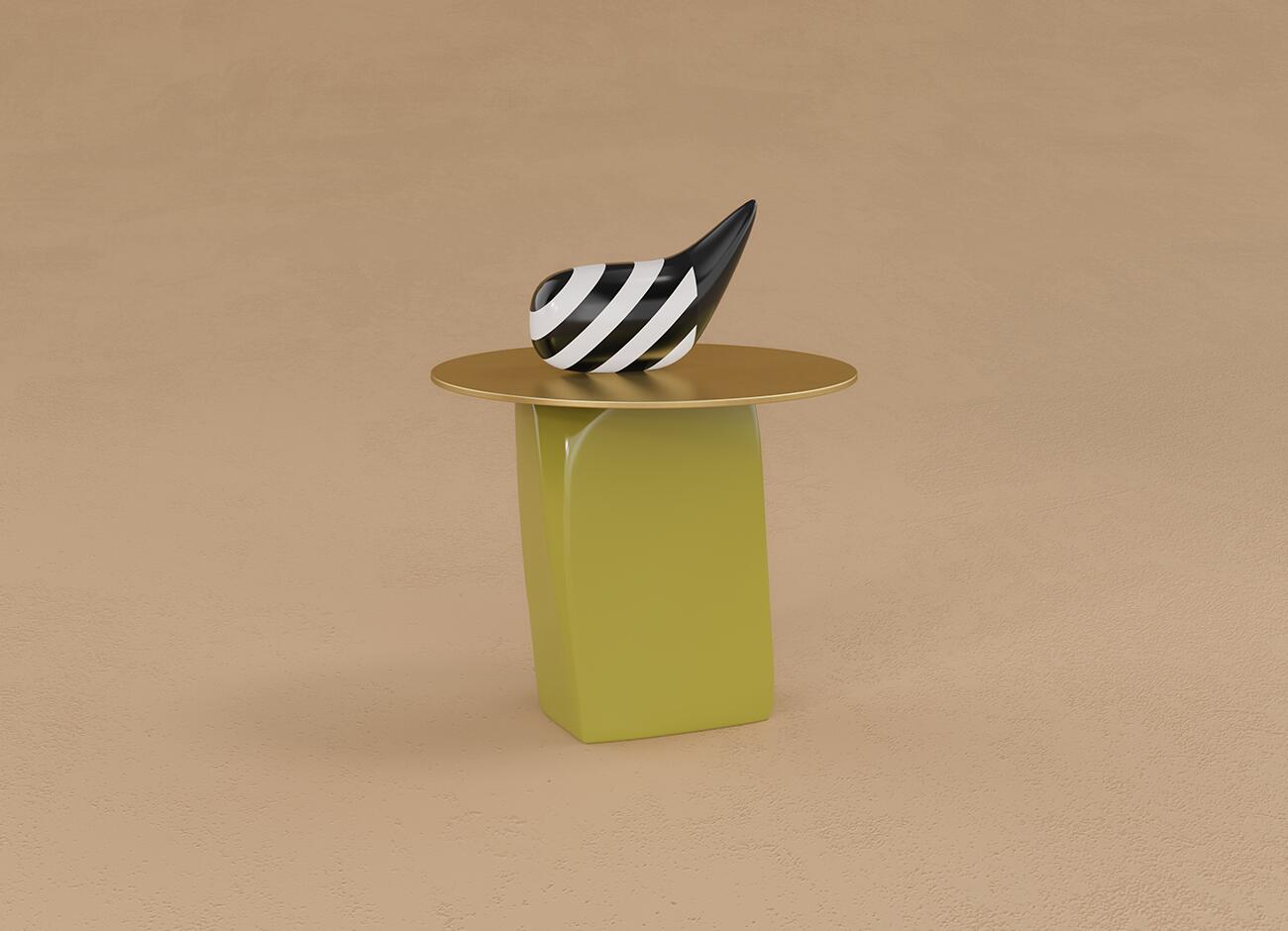 Front view of the echoes side table. It features a solid, geometric olive-green lacquered wood base and a thin, circular brushed brass top. A curved, teardrop-shaped decorative object with black and white stripes rests on top. The background is a textured beige.