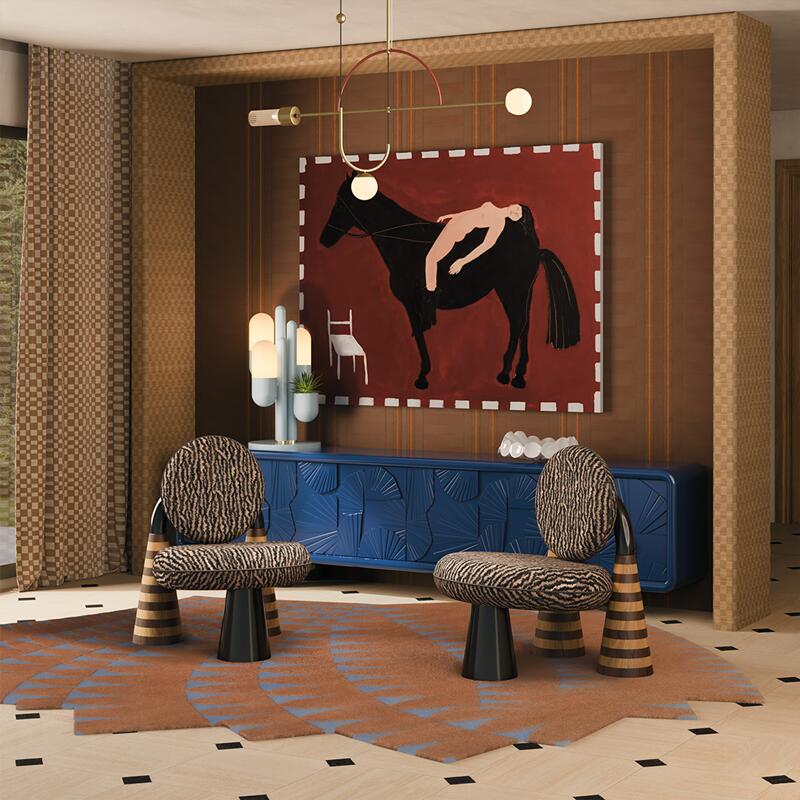 A luxurious, eclectic living room featuring two totora armchairs by malabar in the foreground. The armchairs have circular backs and seats upholstered in a zebra-patterned fabric, supported by sculptural, cone-shaped wooden legs with tiered rings. In the background, a vibrant sapphire blue mon ooh sideboard features intricate geometric carvings. On top of it sits the light blue cactus table lamp by creativemary. The back wall is covered in textured brown wallpaper, centered by a large expressionist painting of a black horse with a reclining figure on its back against a deep red background. The room is illuminated by a tortona suspension lamp with brass arms and a red arch. The floor is light wood with black diamond accents, partially covered by a jagged-edge rug in terracotta and blue geometric patterns.