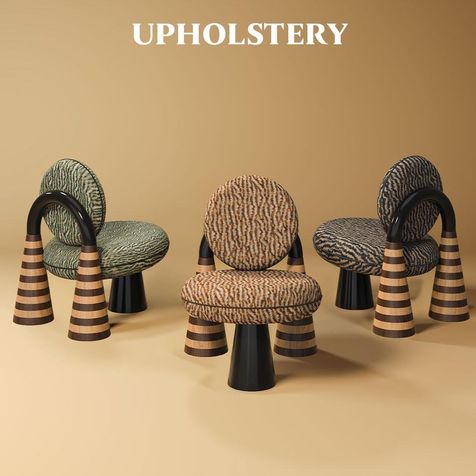 Three artistic accent chairs, totara armchair, from malabar's upholstery collection, featuring circular backs, patterned fabric, and sculptural striped wooden legs against a neutral background.