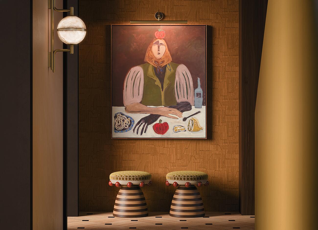 Two krom mea stools with olive-toned upholstery and red spherical accents placed symmetrically beneath a large, abstract portrait in a sophisticated hallway. The warm lighting highlights the textured wallpaper and the striped wood grain of the stools, presenting them as functional pieces of art within a curated interior.